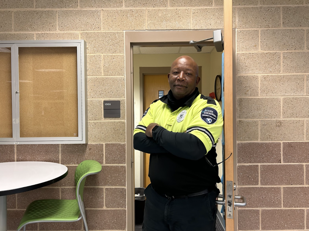 Green Hope security guard, Clyde Smith, poses for a picture as he gets ready to perform his lunchtime duties.